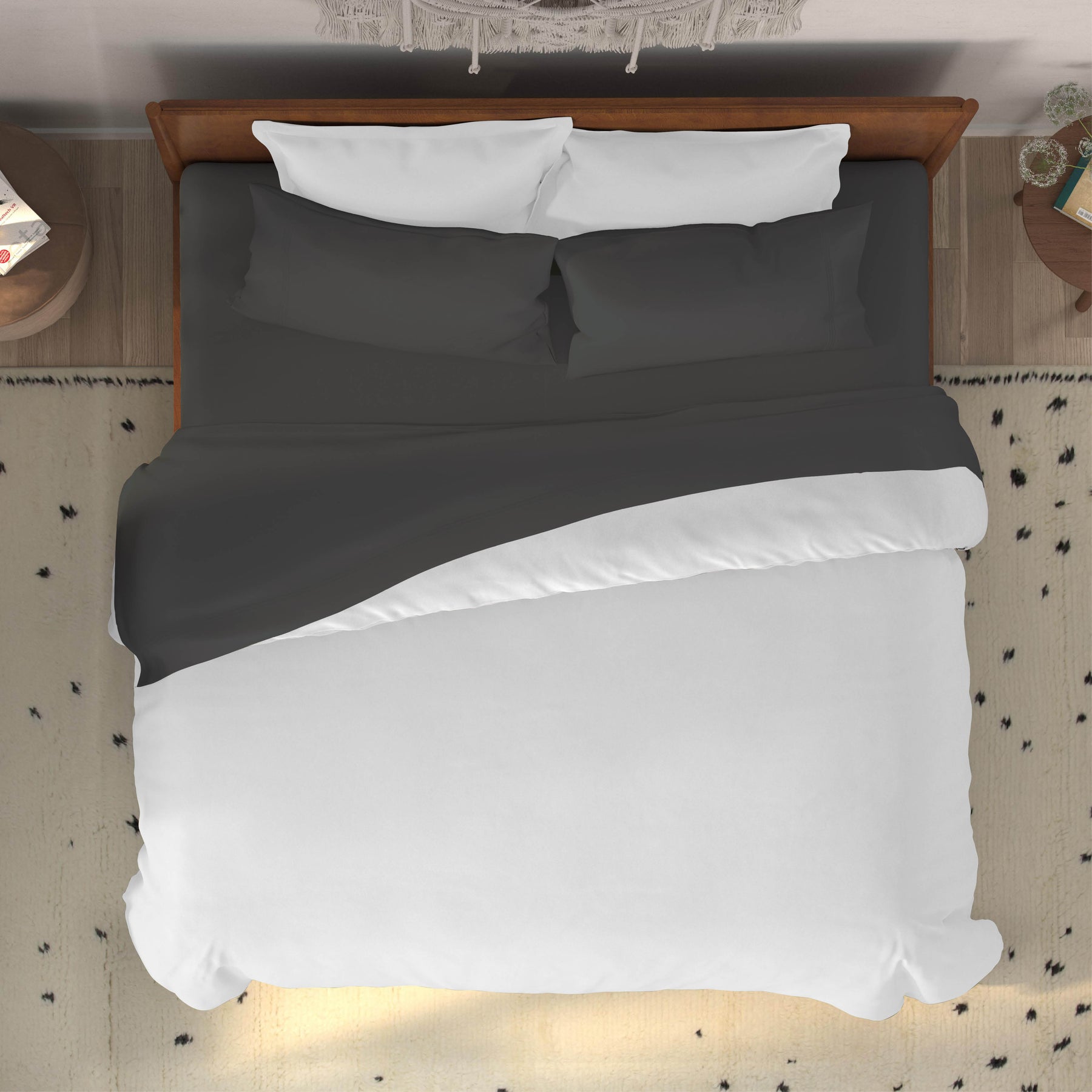 Top-down image of a dressed bed with Shadow Bamboo Rayon Sheets and a white duvet cover